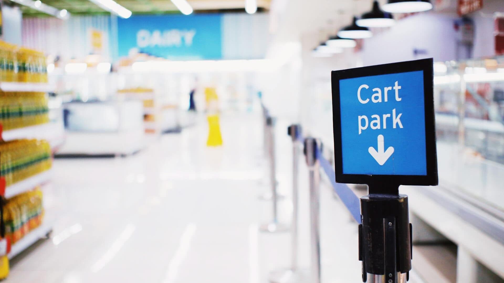 Supermarket advertising displayed on trolley and in-store screens