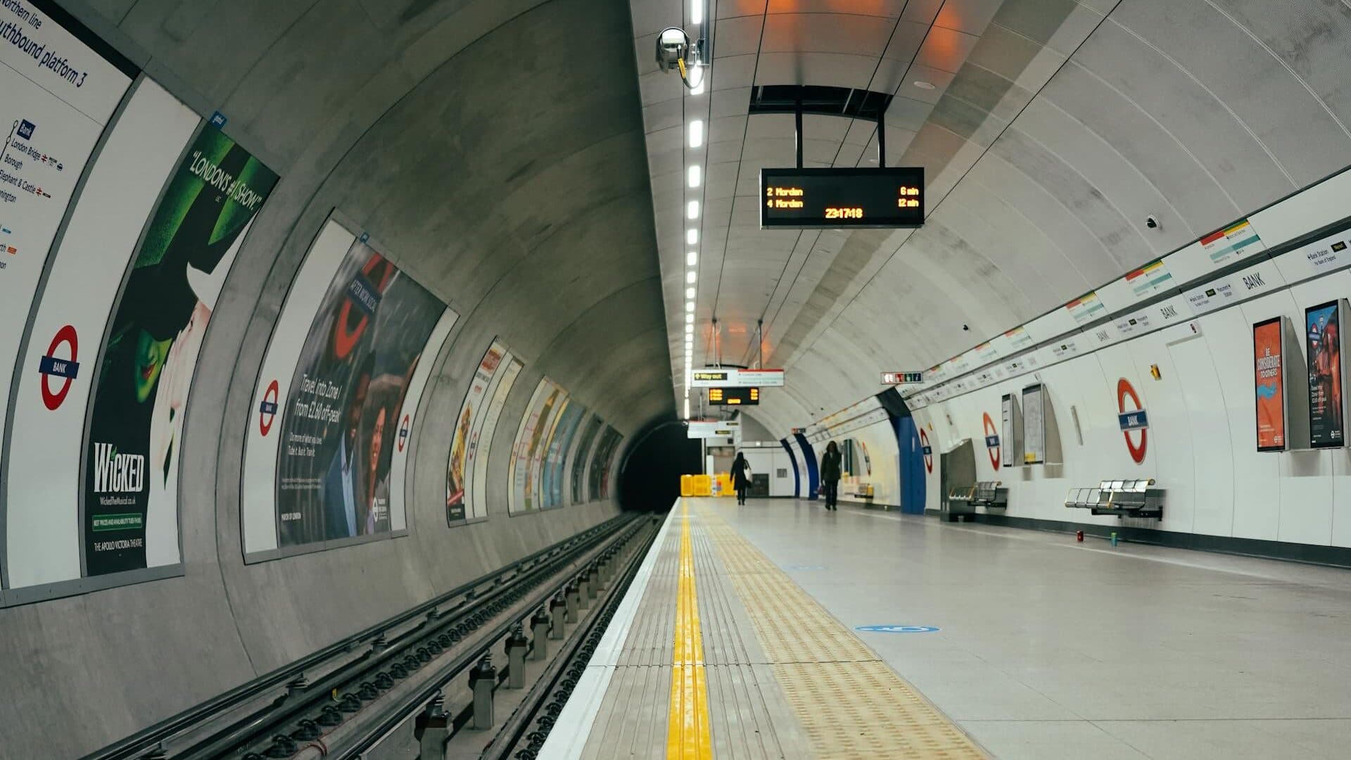 Advertising panels along a London Underground escalator
